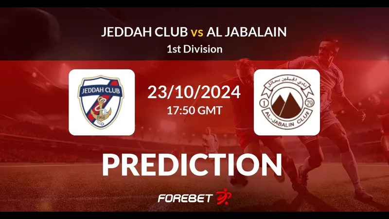 Cầu thủ của Al Jubail chạy với bóng qua hàng phòng ngự của Al Jabalain